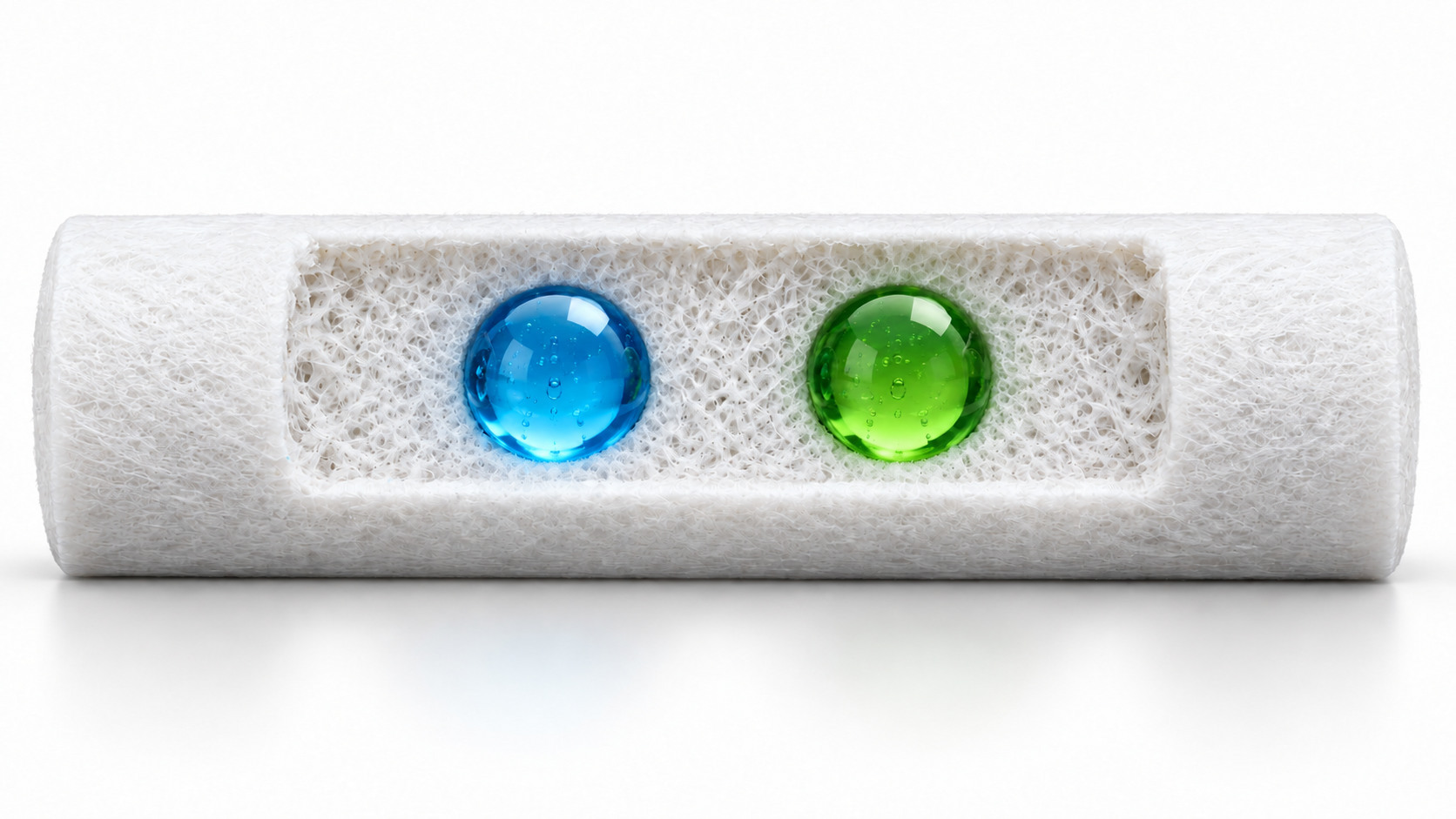 Concept cutaway showing two separate blue and green capsules within a filter